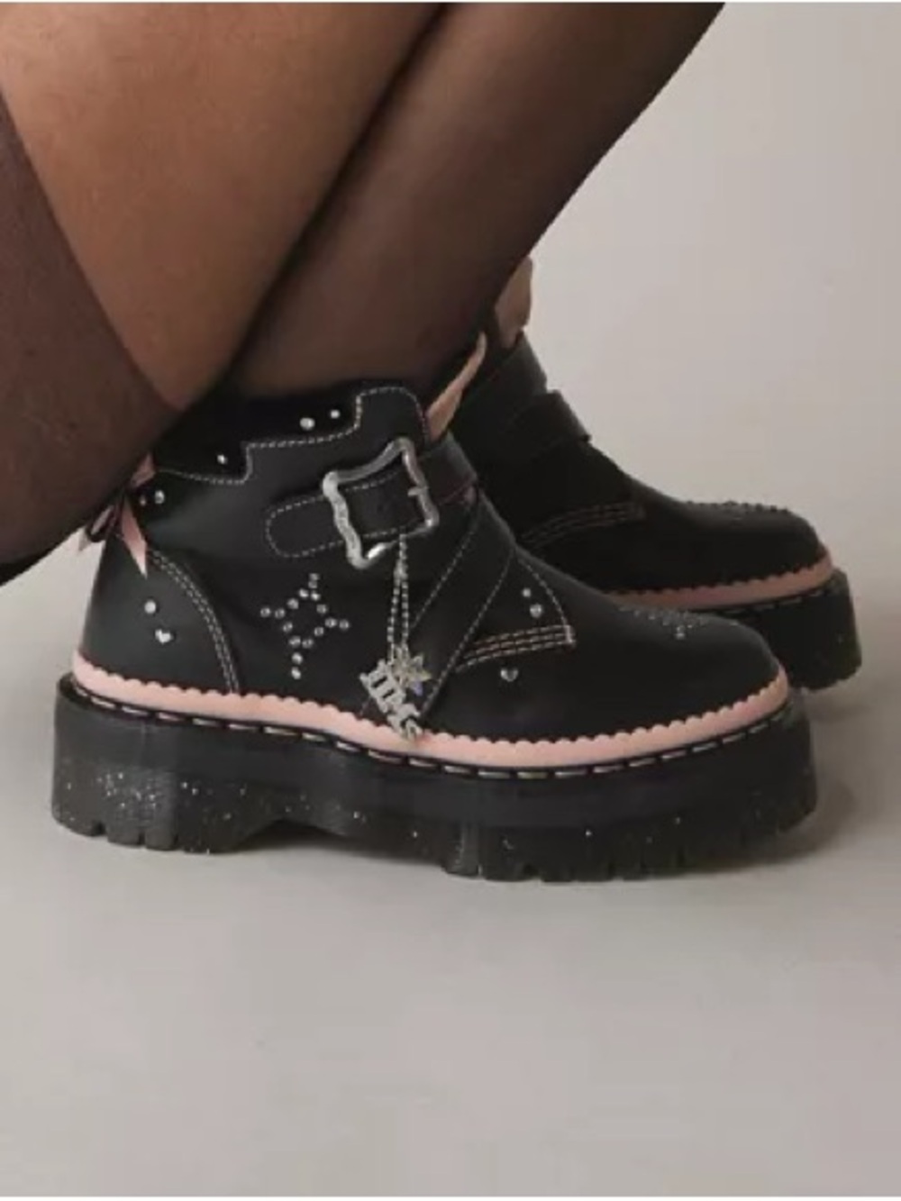 Dr. Martens Black Powder Pink Caitie Leather Buckle Stuffed Platform Boots